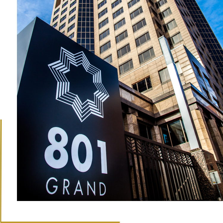 the 801 Grand Building sign next to the building